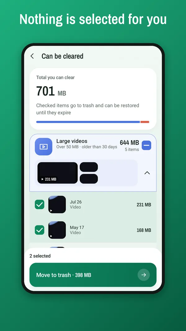 Large videos expanded with two items checked and a Move to trash button